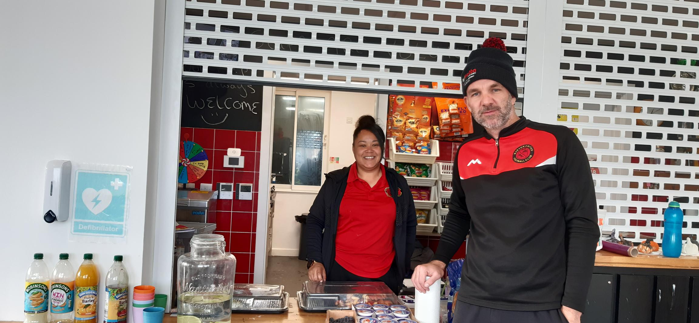 BUFC coaches presenting their cafe stand